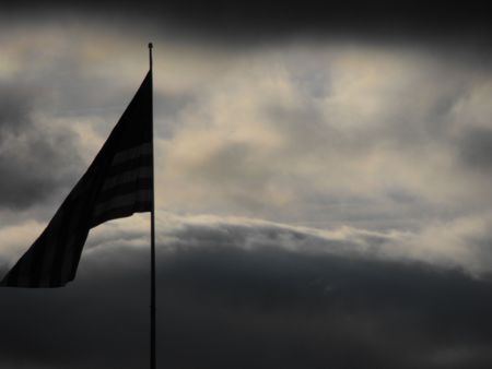 Flag silhouette on a stormy day
