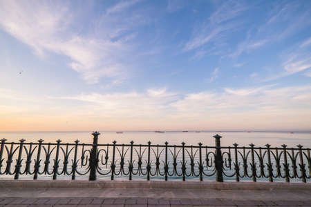 Beautiful sunrise in Tarragona (Spain) seen from BalcÃ³ del Mediterrani (Mediterranean Balcony), a walk with a sea view.の写真素材