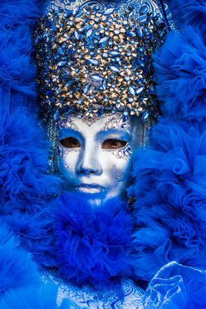 Venice, Italy - February 16, 2020: An unidentified person in a carnival costume in Piazza San Marco attends at the Carnival of Venice.のeditorial素材