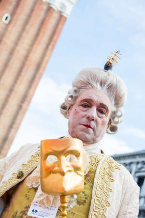 Venice, Italy - February 16, 2020: An unidentified person in a carnival costume in Piazza San Marco attends at the Carnival of Venice.のeditorial素材