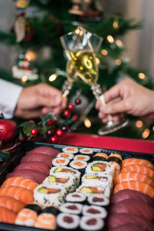Sushi nigiri and maki set with Christmas or New Year concept background. Traditional japanese food.の写真素材