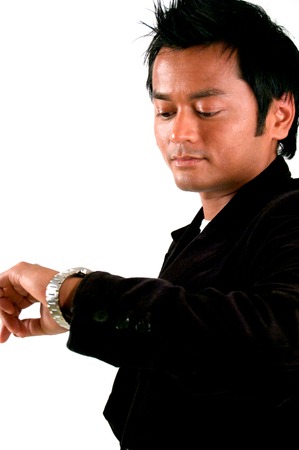 business man looking at watchの写真素材
