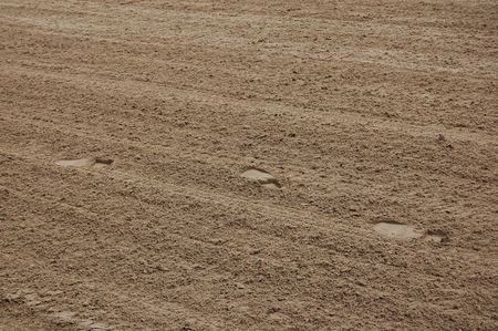 three footsteps in the sand