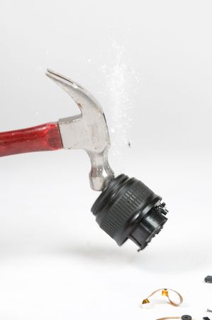 hamer is smashing a camera lensの写真素材