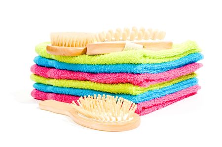 Multicolour towels with spa objects on white backgroundの写真素材