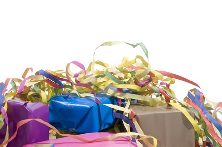 presents wrapped in paper with colorful streamersの写真素材
