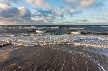 the waves of the sea Sunny day, beautiful clouds