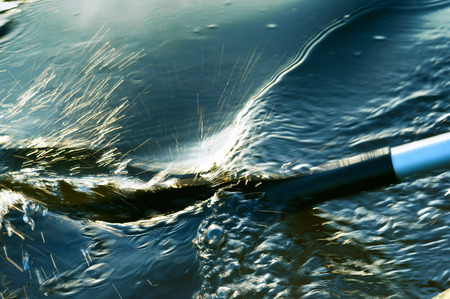 paddle boat in the water, rowing in a boat, boatingの写真素材