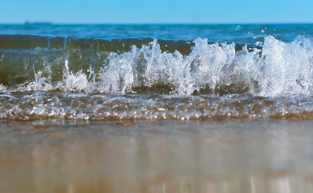sea water foam, sea wave, the excitement on the shore sea, the water is boiling