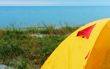 tourist tent on the beach, camping with tents in the summerの写真素材