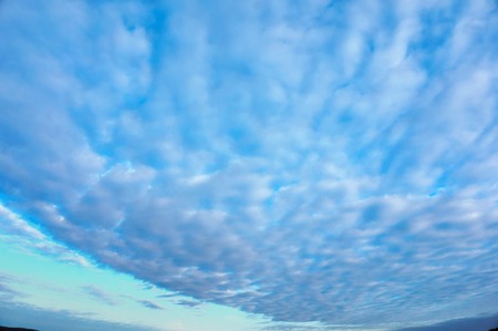 white clouds, blue sky in the cloudsの写真素材