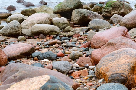 the background of sea stone, the texture of the stoneの写真素材