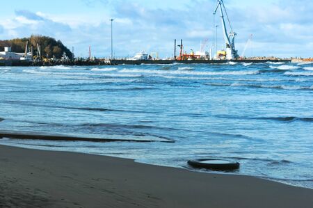 waves and sea port, a storm at sea near port, Baltic sea, city of Pionerskiy, Kaliningrad region, Russia, 28 October 2018のeditorial素材