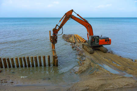 construction equipment on the shore, the construction of breakwaters, coastal protection measures,...