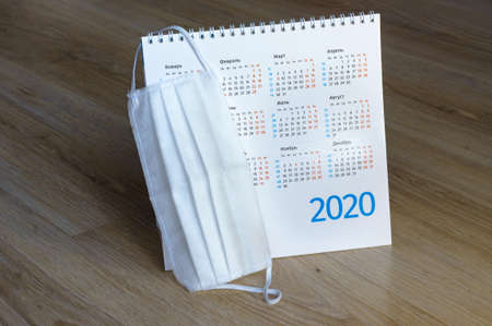 medical mask and calendar, sanitary mask and desktop chronology