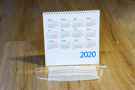 medical mask and calendar, sanitary mask and desktop chronology