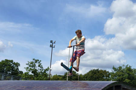 scooter sport, young people in a skate Park, stunt scooters, freestyle scootering, Russia, Kaliningrad, Kaliningrad skate Park, August 5, 2020のeditorial素材