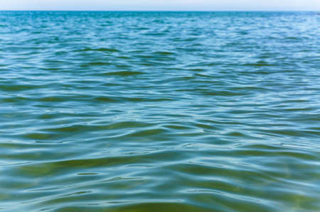clear water surface, smooth green waterの写真素材