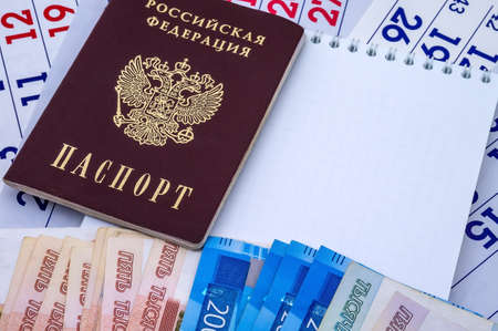 Notepad for notes and Russian money, Russian passport and rublesのeditorial素材