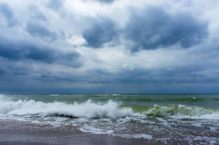 cloudy weather, baltic sea, sea waves, clouds in the skyの写真素材