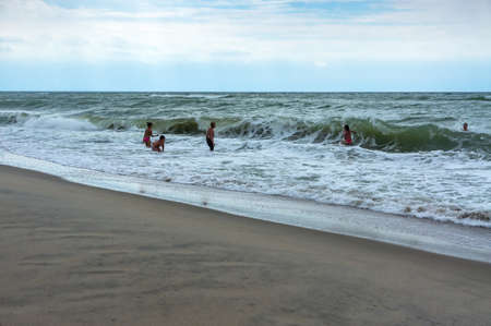 Baltic Sea, Russia, Kaliningrad region, July 5, 2020, children swim in the sea, children in the sea wavesのeditorial素材