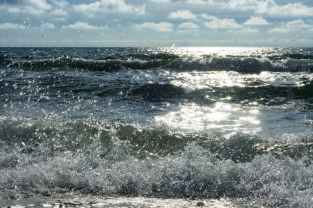 cloudy weather, baltic sea, sea waves, clouds in the skyの写真素材