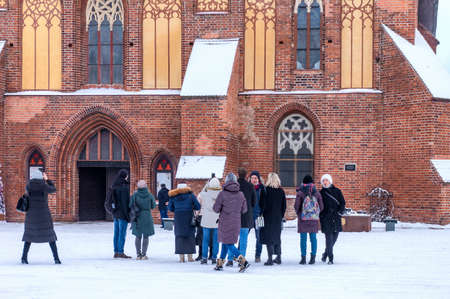 Kaliningrad, Russia, January 29, 2021. Cathedral on Kant island in Kaliningrad, group of tourists group of tourists on excursions, tourists sightseeing, Old townのeditorial素材