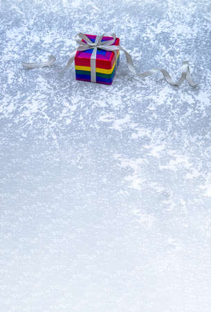 LGBT style gift packaging, rainbow color boxes, gray backgroundの写真素材