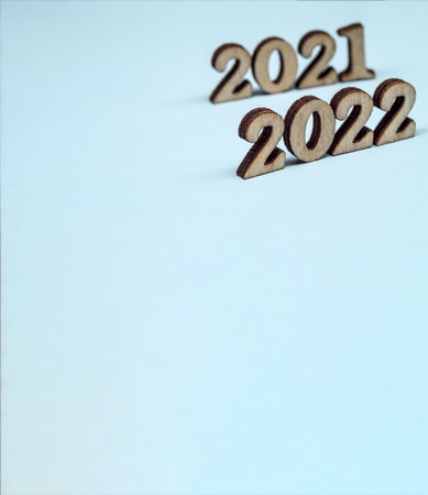 Banner 2022. Figures 2022 on blue background. Wooden figures on blue background. New Year's...