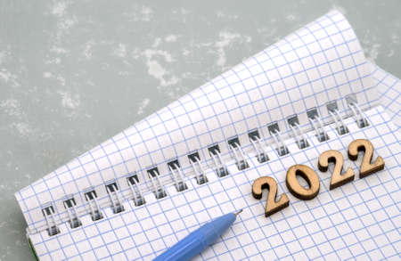 Coins and Figures 2022. Banner 2022. Money stacked in columns.の写真素材