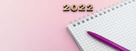 Coins and Figures 2022. Banner 2022. Money stacked in columns.の写真素材