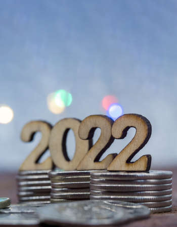 Coins and Figures 2022. Banner 2022. Money stacked in columns.の写真素材