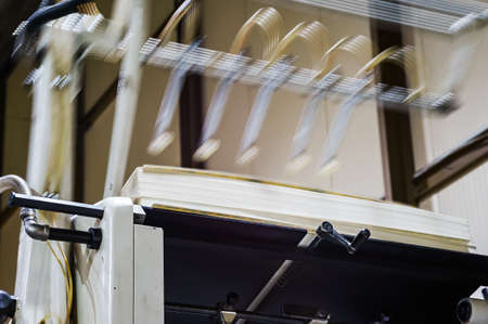 Printing equipment. Machine for varnishing printed products. Printing house. Processing after offset...