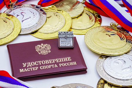 Kaliningrad, Russia, December 12, 2020. Badge sporting title master of sports. Document Master of Sports of Russia.の写真素材