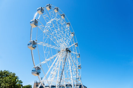 Zelenogradsk, Kaliningrad region, Russia, 17 July 2022. Ferris wheel. The promenade of the Baltic Sea. The Ferris wheel at the resort.のeditorial素材