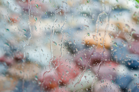 Rain on the window. Background of water droplets on glass.