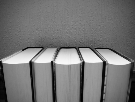 Black and white image of a row of books pages facing outwardの写真素材