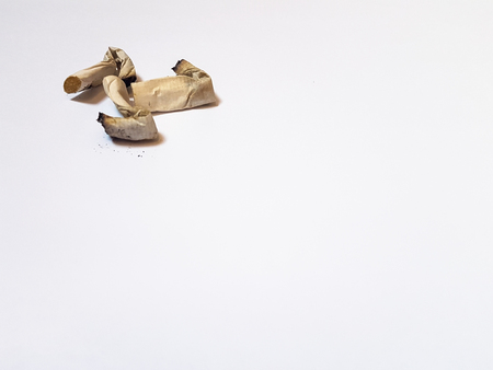 Crushed cigarettes on a white backgroundの写真素材