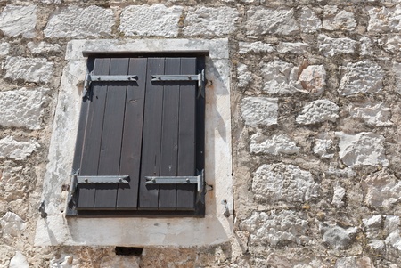 a classic croatian window in the city of vrboskaの写真素材
