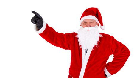 Christmas Santa Claus closeup portrait. Pointing at copyspace. Isolated on White Backgroundの写真素材