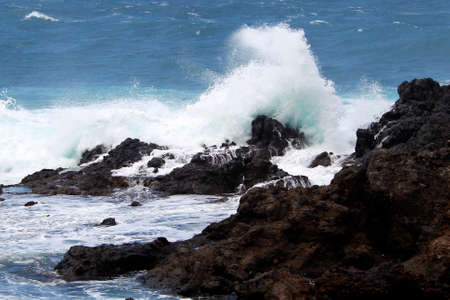 wild waves hitting on the rocks