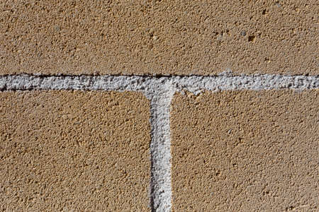 stone wall with linear shapes