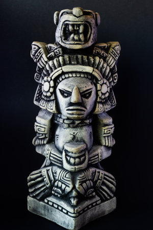 figure of a god of Inca civilization in black and white