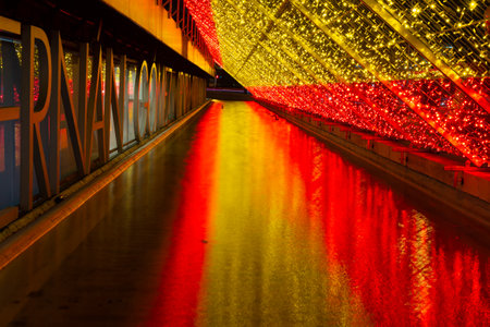 Madrid, Spain- December 15, 2020: Paseo de Recoletos In Madrid with Spanish flag of Christmas lights .Night photo.のeditorial素材