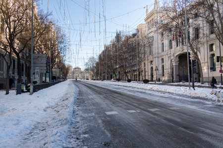 Madrid, Spain- January 9, 2021: AlcalÃ¡ de Madrid street cut by snow after storm Filomena. Storm Filomena. Great snowfall in Madrid. Filomenaのeditorial素材
