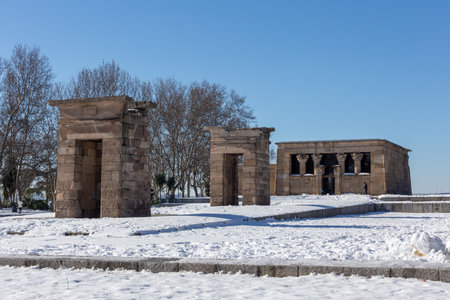 Madrid, Spain- January 9, 2021: Temple of Debod in Madrid covered by snow after storm Filomena....