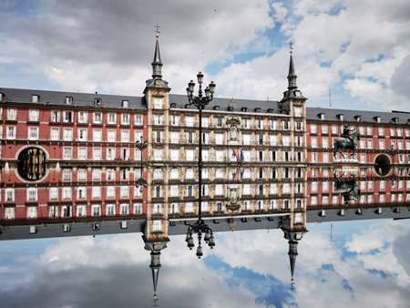 Madrid, Spain- April 21, 2021: Plaza Mayor in Madrid reflected in a mirror. Bakery house on the Playa Mayor in Madrid. Royal Square. Famous architecture. Building with historyのeditorial素材
