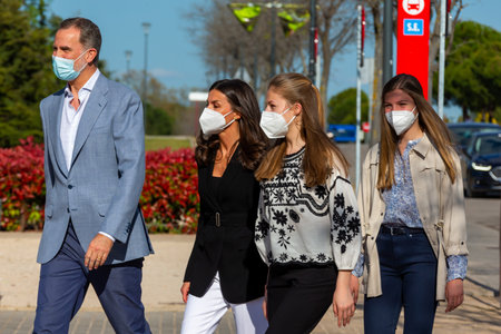 Madrid, Spain- April 16, 2022: The King and Queen of Spain and their daughters the Princess of Asturias and the Infanta Sofia visit the Ukrainian refugee center in Madrid. Ukrainian children and the Kのeditorial素材
