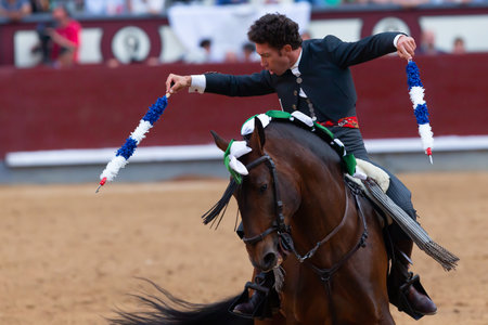 Madrid, Spain- May 14, 2022: Bullfight with the bullfighter on horseback in the Las Ventas bullring.のeditorial素材
