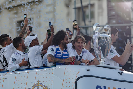 Madrid, Spain- May 29, 2022: Real Madrid CF celebrates its 14th European Championship in Madrid. Luka Modric and Marcelo captain the bus that transports the champions' cup.のeditorial素材